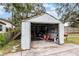 Metal storage shed with garage door at 1245 Rawls Dr, Lakeland, FL 33801