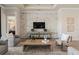 Spacious living room featuring a contemporary fireplace and stylish furnishings at 1623 Green Orchard St, St Cloud, FL 34771