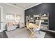 Bright office space featuring a large desk and two armchairs at 1623 Green Orchard St, St Cloud, FL 34771