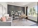 Home office with built-in shelving and large window at 1623 Green Orchard St, St Cloud, FL 34771