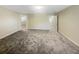 Large bedroom with carpeted floor and access to a bathroom at 1949 Mountain Pine St, Ocoee, FL 34761