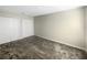 Simple bedroom with carpet and double closets at 1949 Mountain Pine St, Ocoee, FL 34761