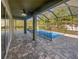 Relaxing pool and patio with covered lanai at 1949 Mountain Pine St, Ocoee, FL 34761