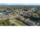 Aerial view of a residential neighborhood, showcasing a variety of homes and landscaping at 2133 E Parkton Dr, Deltona, FL 32725