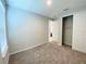 Well-lit bedroom with a large closet and neutral decor at 2364 Kestrel Perch Pl, Winter Park, FL 32792