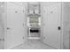 Luxurious bathroom with marble flooring and access to the bedroom at 2912 Sunset Lakes Blvd, Kissimmee, FL 34747