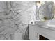 Modern bathroom with white vanity, vessel sink, and marble tile at 2912 Sunset Lakes Blvd, Kissimmee, FL 34747