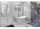 Elegant bathroom featuring a freestanding tub, large shower, and marble at 2912 Sunset Lakes Blvd, Kissimmee, FL 34747