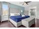 Spacious bedroom with king-size bed and ensuite bathroom at 2912 Sunset Lakes Blvd, Kissimmee, FL 34747