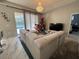 Spacious living room with sectional sofa at 2912 Sunset Lakes Blvd, Kissimmee, FL 34747