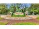 Stonebridge Place community entrance with landscaping and signage at 3190 Dante Dr # 304, Orlando, FL 32835