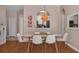 Open dining area with a view into the kitchen at 3190 Dante Dr # 304, Orlando, FL 32835