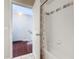Bathroom with tub, shower, and access to upper floor at 4408 Sun Village Blvd, Kissimmee, FL 34746