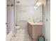 Bathroom with double vanity and bathtub at 4408 Sun Village Blvd, Kissimmee, FL 34746
