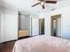 Spacious bedroom with walk-in closet and ceiling fan at 4408 Sun Village Blvd, Kissimmee, FL 34746