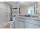 Bathroom with double vanity and granite countertop at 543 Zinfandel Dr, Holly Hill, FL 32117