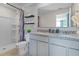 Double vanity bathroom with granite countertop at 545 Zinfandel Dr, Holly Hill, FL 32117