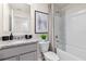 Clean bathroom with granite countertop, bathtub, and shower at 545 Zinfandel Dr, Holly Hill, FL 32117