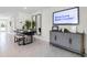 Dining area with modern table, bench and mirrors at 545 Zinfandel Dr, Holly Hill, FL 32117
