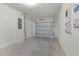 Clean and spacious garage with overhead door at 545 Zinfandel Dr, Holly Hill, FL 32117