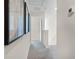 Upstairs hallway with carpet and access to other rooms at 545 Zinfandel Dr, Holly Hill, FL 32117