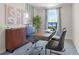 Bright home office features a large desk and comfortable seating at 545 Zinfandel Dr, Holly Hill, FL 32117