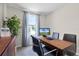 Home office with wood desk and two chairs at 545 Zinfandel Dr, Holly Hill, FL 32117