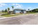 Community pool area with a gate and surrounding landscaping at 545 Zinfandel Dr, Holly Hill, FL 32117