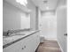 Modern bathroom with double vanity, granite countertop, and a shower at 765 6Th Ave, Osteen, FL 32764