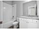 Modern bathroom with white cabinets and granite countertop at 765 6Th Ave, Osteen, FL 32764