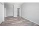 Spacious bedroom with wood-look flooring and neutral walls at 765 6Th Ave, Osteen, FL 32764