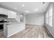 Open concept living room with kitchen and lots of natural light at 765 6Th Ave, Osteen, FL 32764