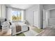 Main bedroom with large window and sitting area at 765 6Th Ave, Osteen, FL 32764