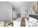 Main bedroom with large window and neutral decor at 765 6Th Ave, Osteen, FL 32764