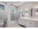 Double vanity bathroom with a modern soaking tub and shower at 812 Montana St, Orlando, FL 32803