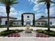 Community entrance with fountain and landscaping at 11209 Lemon Lake Blvd, Orlando, FL 32836