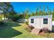 Well-maintained storage shed in a landscaped backyard at 1405 Spring Lake Ter, Ocoee, FL 34761