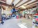 Organized garage workshop, abundant storage, workbench, and tools at 1405 Spring Lake Ter, Ocoee, FL 34761