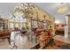 Spacious living room with high ceilings, a large chandelier, and unique decor at 14502 Scotch Pine Ct, Orlando, FL 32832