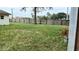 Backyard with a grassy area and wooden fence at 2902 Calumet Dr, Orlando, FL 32810