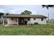 House exterior showcasing a backyard with patio and shed at 2902 Calumet Dr, Orlando, FL 32810