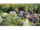 Aerial view of neighborhood with lush green trees at 300 Spring Run Cir, Longwood, FL 32779