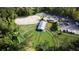 Aerial view of stables and paddocks at 300 Spring Run Cir, Longwood, FL 32779