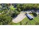 Aerial view of horse riding arena and stables at 300 Spring Run Cir, Longwood, FL 32779