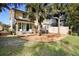 Spacious deck with seating area, overlooking a landscaped backyard at 300 Spring Run Cir, Longwood, FL 32779