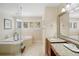 Elegant bathroom with granite countertops, a soaking tub, and a walk-in shower at 300 Spring Run Cir, Longwood, FL 32779