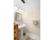Bathroom with pedestal sink, mirror and towel rack at 300 Spring Run Cir, Longwood, FL 32779