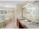 Elegant bathroom with granite countertops, a soaking tub, and a walk-in shower at 300 Spring Run Cir, Longwood, FL 32779