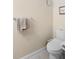 Small bathroom with toilet and wall-mounted towel rack at 300 Spring Run Cir, Longwood, FL 32779
