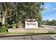 Gated community entrance sign, welcoming residents and guests to Springs at 300 Spring Run Cir, Longwood, FL 32779
